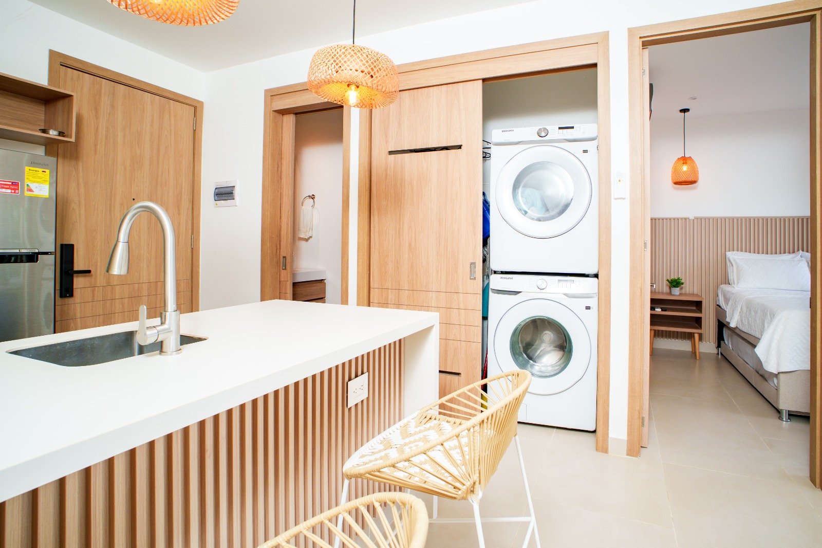 Kitchen with counter and stools